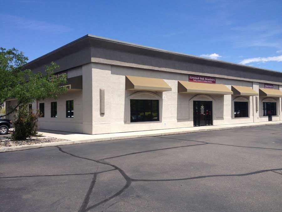 Exterior of the Crested Oak Dentistry building with signage, Grand Junction, Colorado